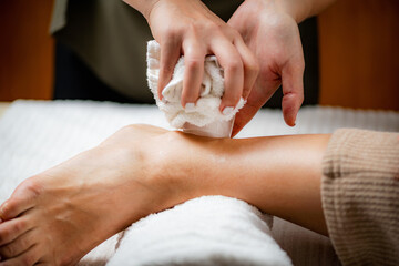 Obraz na płótnie Canvas Ankle Joint Cryotherapy Ice Massage.