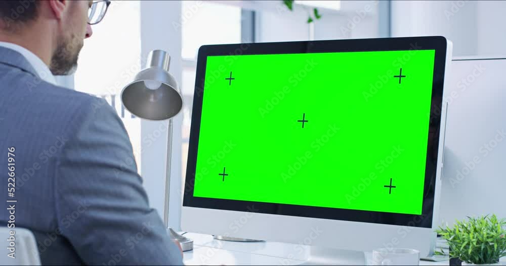Poster greens creen, copyspace and chromakey on a computer screen with tracking markers and a business man 