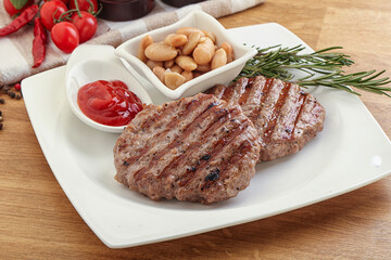 Grilled beef burger cutlet with sauce