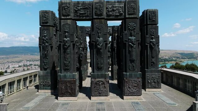 Chronicle Of Georgia, Massive Monument Of 16 Pillars In Tbilisi, Georgia - drone shot