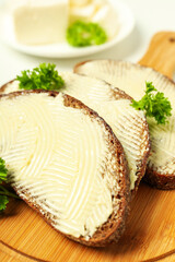 Concept of breakfast, eat food with butter, close up