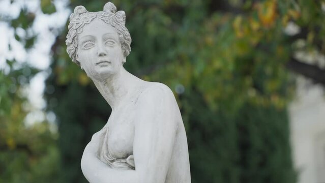 Timeless statue of a woman in the park