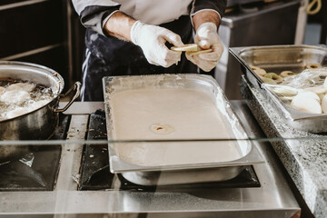 Chef making or working with dough