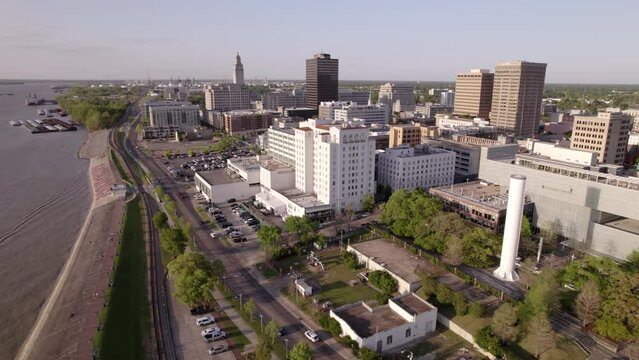 Aerial Forward Shot Of Office Of The Governor In State Building By River -  Baton Rouge, Louisiana