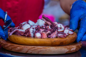 octopus cooked Galician style at a typical fair