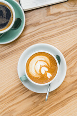 Top view of cup of coffee on table