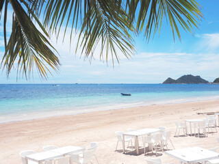 Outdoor cafe on summer beach.