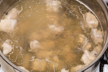 Boiling of the meat broth during cooking in a pot