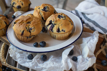 Homemade blueberry muffins on a plate