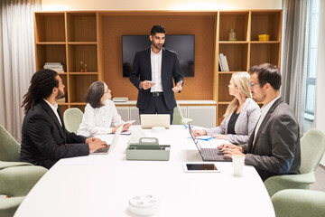 Young businessman as a consultant in a coaching workshop