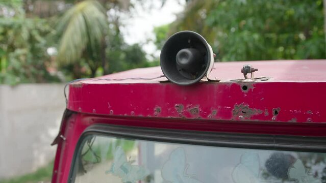 A Choon Paan seller drives around with his tuk-tuk and sells bread and other bakery products to the locals in Colombo.