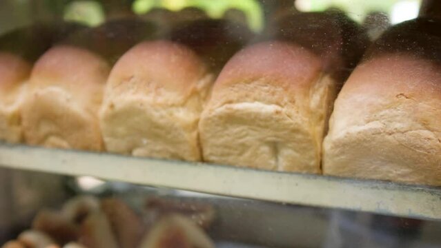 A Choon Paan seller drives around with his tuk-tuk and sells bread and other bakery products to the locals in Colombo.