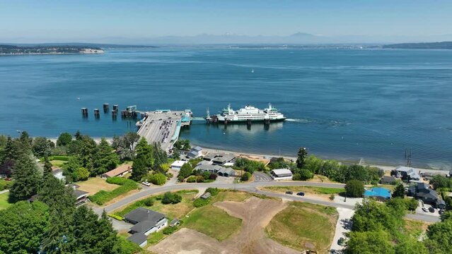 Wide aerial shot of the Clinton ferry terminal in action on Whidbey Island.