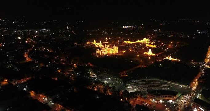 Aerial shot of Mysore palace fully illuminated at night