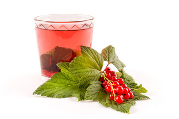 Tea made from berries and leaves of black and red currants in a transparent glass (mug) on a white isolated background. Template, design. A useful alternative to pills for colds and flu.