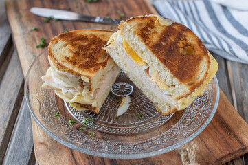 Roasted bread with ham, egg and cheese