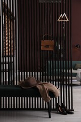 Obraz premium Key holder on black wooden folding screen in room