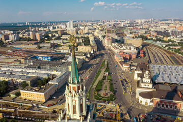 Fototapeta premium Summer view of the road and train station in Moscow from the height of a drone