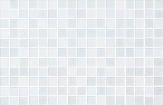 White tile wall chequered background bathroom floor texture. Ceramic wall and floor tiles mosaic background in bathroom. 