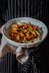 Vareniki and chanterelle mushrooms