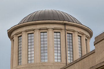 A fragment of a building with a round dome.