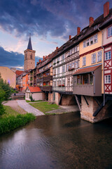 Erfurt, Germany. Cityscape image of downtown Erfurt, Germany with the Merchant's Bridge at summer sunrise.