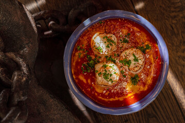 Fried sea scallop with tomato sauce