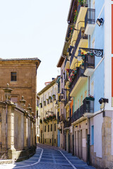 Exterior of a modern and ancient architecture alley with colorful buildings in Spain