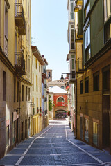 Exterior of a modern and ancient architecture alley with colorful buildings in Spain