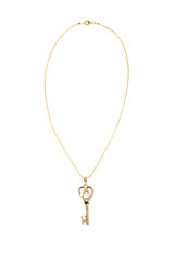 Jewelry pendant in the form of a key on a gold chain on a white isolated background