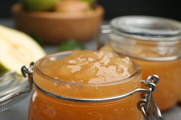 Delicious pear jam in glass jar, closeup