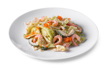 Salad with shrimps, cucumbers, tobiko caviar, salad and sauce