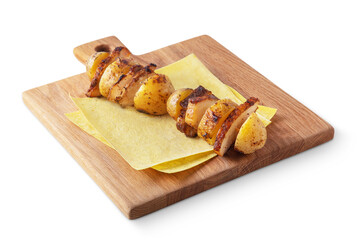 Ham fried on a skewer with potatoes and lavash