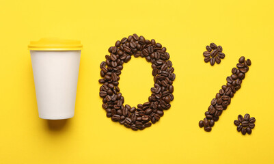0 percent made of coffee beans and paper cup on yellow background, flat lay. Decaffeinated drink