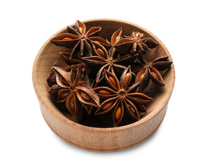 Aromatic anise stars in wooden bowl isolated on white
