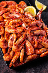 Boiled shrimps in sauce with lemon