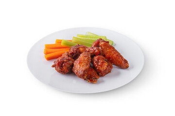 Fried chicken wings with celery and carrots