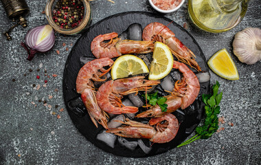 Seafood. Red Argentine shrimps with salt and lemon, Wild shrimps, ocean jumbo shrimps on a dark...