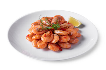 Boiled prawns with pepper, pea sprouts and lemon