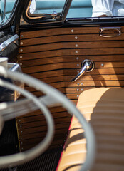 Fototapeta Dashboard and steering wheel of old-timer car obraz