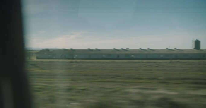 Slow Motion shot from the window of a transport bus on the highway.