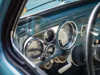 Dashboard and steering wheel of old-timer car