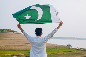 Pakistani boy with Pakistan Flags in hand, Pakistan Independence day