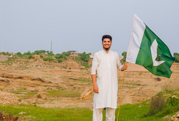 Pakistani boy with Pakistan Flags in hand, Pakistan Independence day