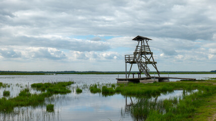 Fototapeta na wymiar Lookout tower on lake 