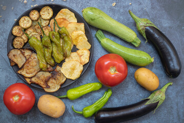 Traditional delicious Turkish food, fried mixed vegetables (potatoes, eggplant, zucchini, roasted peppers), Turkish name; mixed fried vegetables
