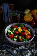 vegetables salad on a plate on a wooden table