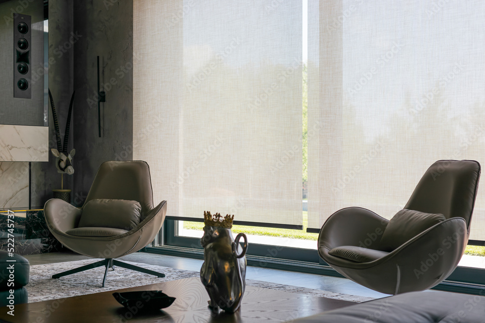 Fototapete roller blinds in the interior. automatic solar shades of large sizes on the window. fabric with line