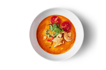 Soup with squid, shrimp, tomatoes, parsley and chili
