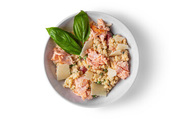 Porridge with salmon, cheese, tomatoes, basil and peas